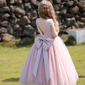 Vestido de fiesta rosa nude maxi con lazo grande