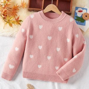 Chompa rosa estampado corazón oversize