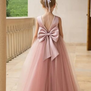 Vestido de fiesta rosa nude espalda abierta con perlas lazo mariposa