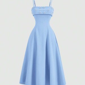 Vestido elegante celeste con perlas pecho maxi corte baja campana