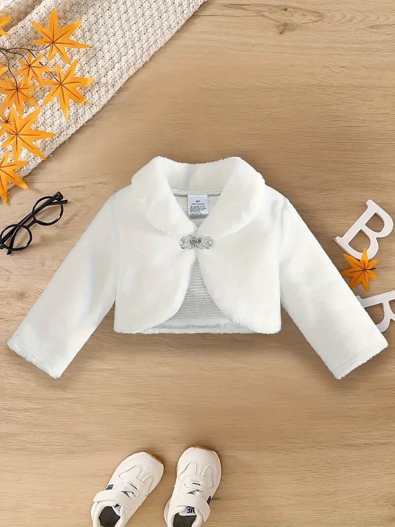 Bolero peluche con pedrería y lazo decorativo sin forro