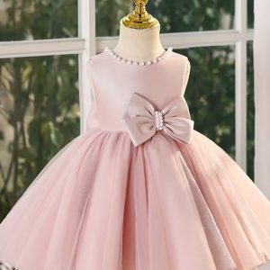 Vestido fiesta lazo delante y atrás, cuello v con perlas rosa nude