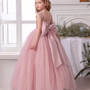Vestido de fiesta elegante rosa cuarzo lazo grande atrás cuello v