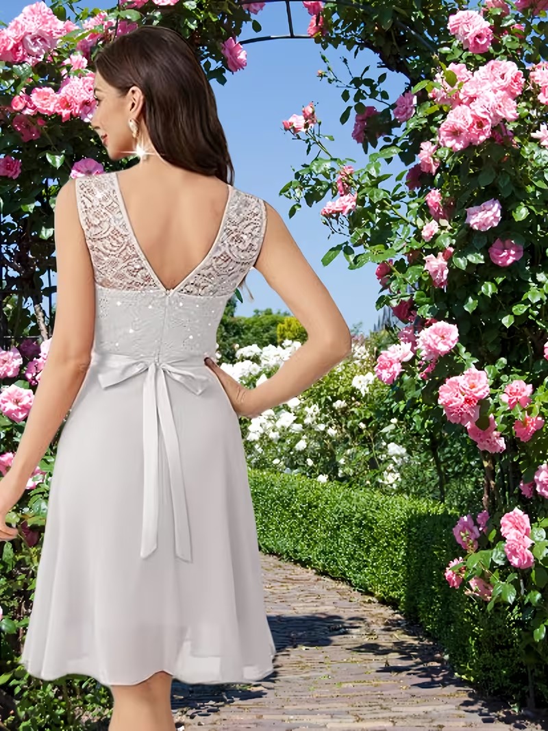 Vestido elegante envolvente sin mangas blanco - Imagen 2