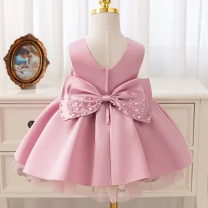 Vestido fiesta kids de satén lazo con perlas hecha a mano palo rosa
