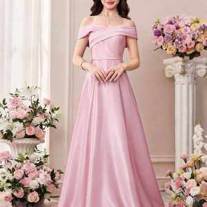 Vestido largo satén premium elegante escote bardot espalda lazo rosado
