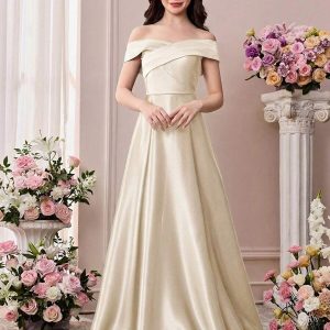 Vestido largo satén premium elegante escote bardot espalda lazo albaricoque
